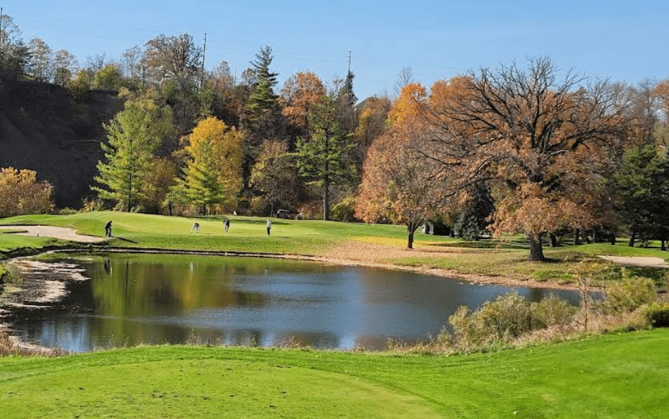 golf course with autumn trees and pond in woodbridge protected by tnsg