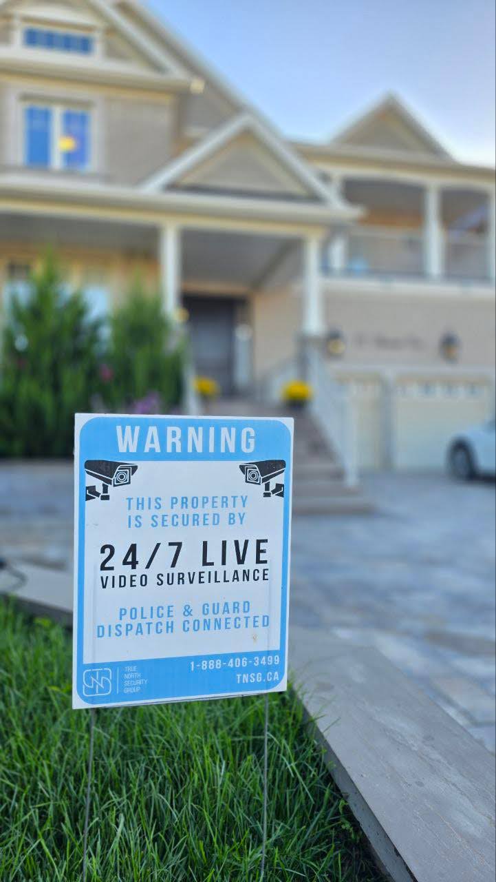 security sign in front of a house