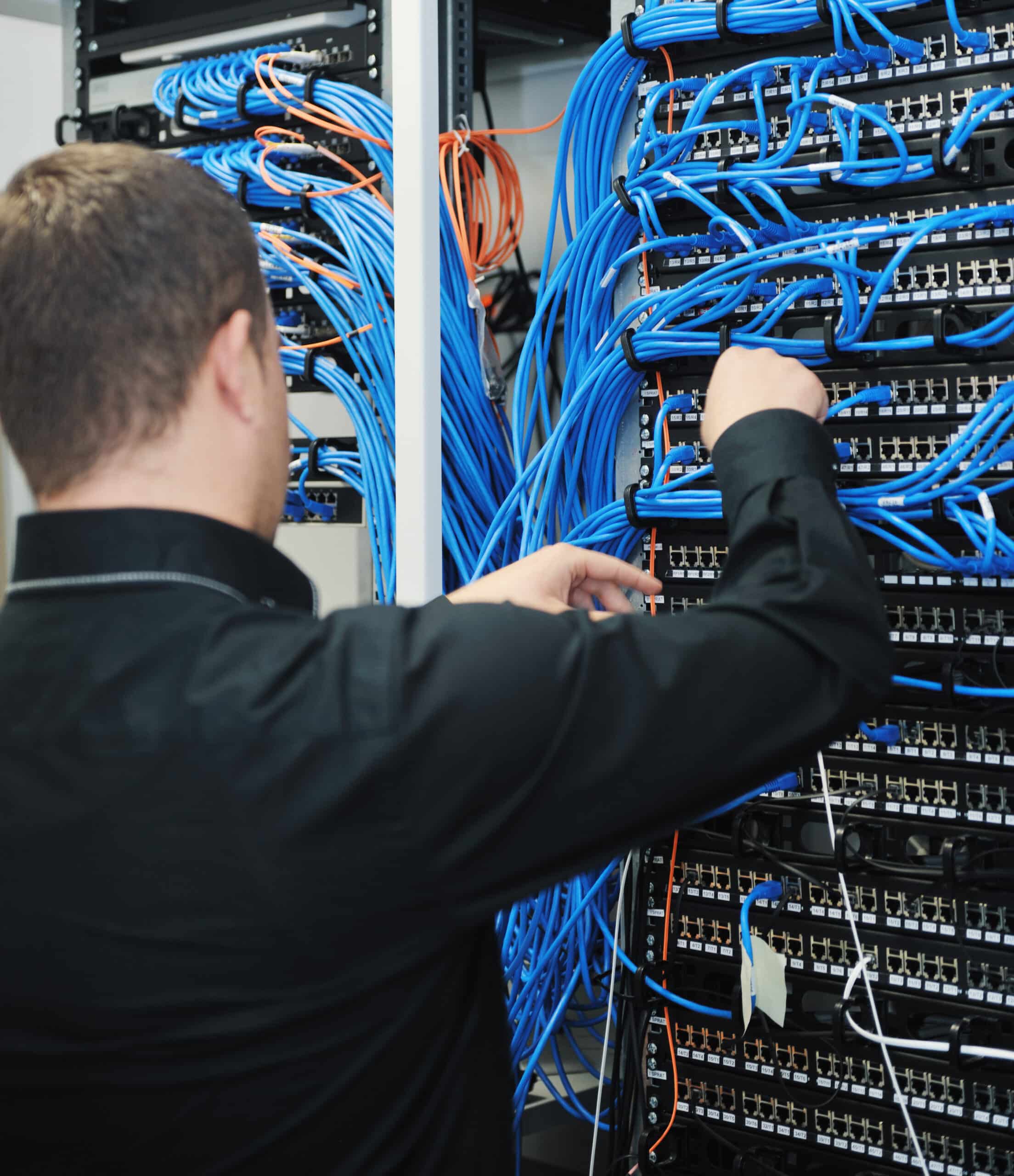 network technician organizing cables