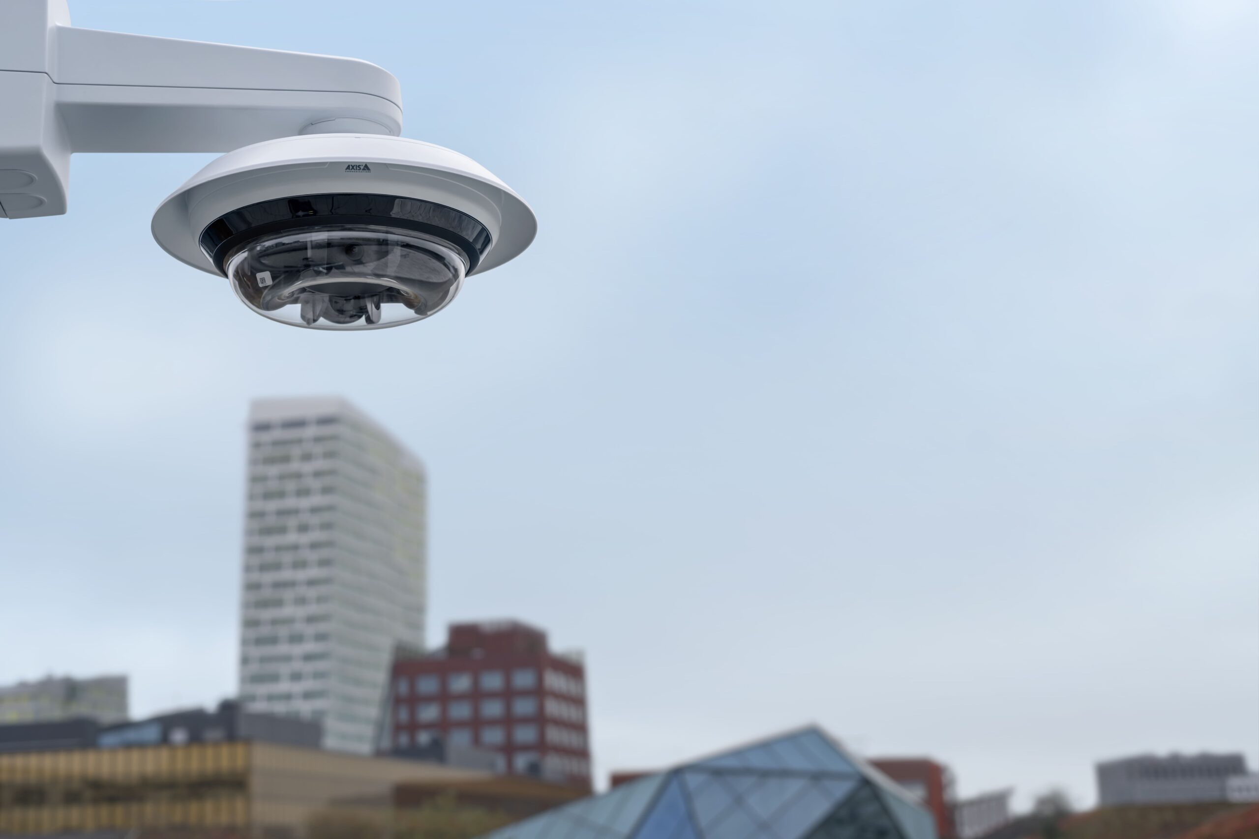 security camera overlooking city buildings installed by security company in Toronto